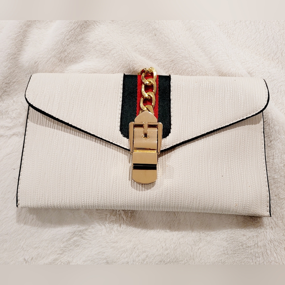 Elegant White Clutch with Gold Chain Accent